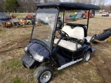 BLACK AND WHITE 4 SEATER GOLF CART, NO CHARGER, HAS BATTERIES