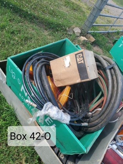 BOX OF BLACK HOSES, CAT BOX, LIGHTS,ETC.