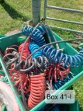BOX OF RED, BLUE, & BLACK COILED HOSES