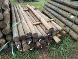 NEW 3.5X8 TREATED WOOD POSTS (LOOSE BUNDLE OF APPROX 35)