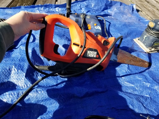 ORANGE BLACK AND DECKER SAW, SELLER SAYS WORKS