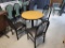 RESTAURANT WOODEN ROUND TABLES (2) AND 3 BLACK LEATHER SEAT CHAIRS, KEPT IN