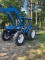 FORD NEW HOLLAND 7740 CAB TRACTOR WITH FRONT END LOADER, HOURS SHOWING: 744