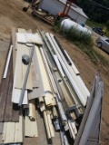 PALLET OF VINYL SIDING AND GUTTERS