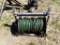 ELECTRIC HOSE REEL WITH HOSE AND CUSHMAN WATER PUMP AND MANIFOLD W/ STRAINE