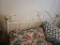 METAL GOLD AND WHITE BED FRAME: INCLUDES ITEMS ON TOP, QUILTS AND AFGHAN