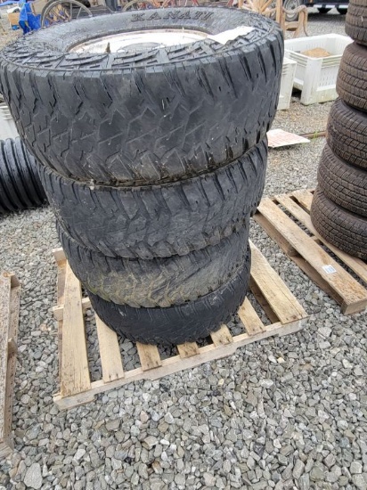 FORD 8-170 WHEEL 315/75/16 TIRES AND WHEELS (4)