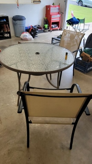 OUTDOOR GLASS TOP TABLE AND (2) MATCHING CHAIRS