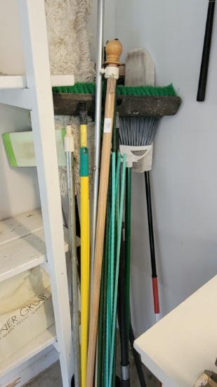 CORNER OF BROOMS AND MOPS