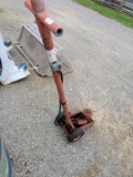 RED FLOOR JACK WITH WHEELS AND HANDLE