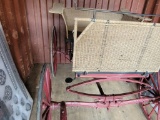 4 WHEEL HORSE CARRIAGE BLACK BODY WICKER SEAT, RED WHEELS, RED FRAME CUSHIO