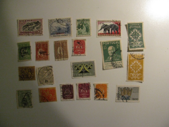 Vintage stamps set of: Portugal, Nigeria, Pakistan, New Guinea & rwanda