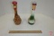 (2) long neck rooster sprinkler bottles, white/green one has hairline crack and chip on neck, both