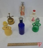 Plastic and glass sprinkler bottles and one brass mister can