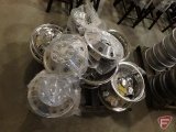 Contents of pallet: dually wheel coverings and hub caps