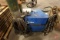 Miller Shopmaster 300 AC/DC CC/CV welding power source on casters/cart