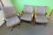 (2) upholstered office chair and 1 office chair on rollers