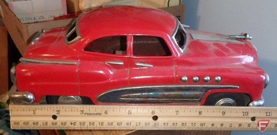 Metal toy car, front wheel needs repair