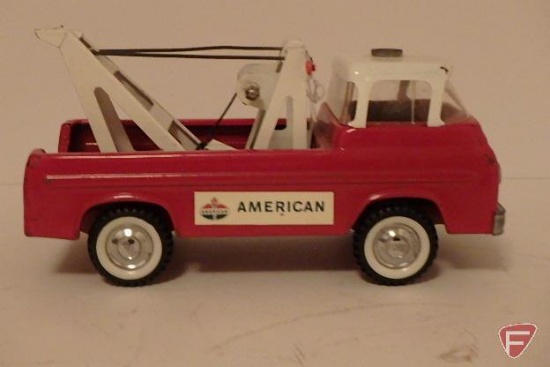 Toy Nylint American Standard Ford tow truck with cracked windshield
