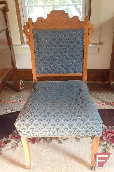 Vintage chair, has been reupholstered, front legs have wheels