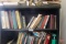 Books on (2) shelves: Machinery's handbooks and others; includes metal shelf