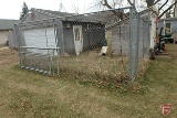 Dog kennel: chain link fence and dog house