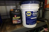 Anti-freeze (partial containers), grease, and hydraulic oil