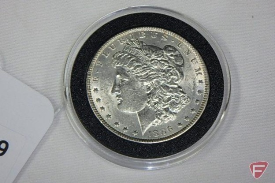 Nice 1886 unc Morgan silver dollar coin, slight toning on the reverse