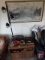 Cabinet and contents: ash trays, radio, Holy Bible, wood art; lamp, and framed picture