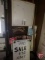 Metal wall cabinet and 'For Sale' signs