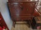 Colonial Desk Co. drop front desk with pigeon hole and drawer; signed Rockford Mfg.