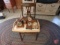 Clocks, tray, and wood folding chair