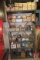 Shelf and contents: nuts, bolts, tractor lights, brass fittings, nails, tail lights, side