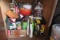 Cleaning supplies on shelf and contents of cabinet: crack filler, hand cleaner, soil acts,