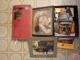 Vintage post cards and pictures in photo album