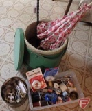 Sewing items: wood basket, buttons, umbrella, parasol with bone-like handle, thread