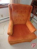 Upholstered arm chair, burnt orange color