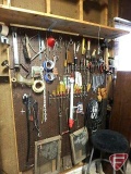 Work light, screw drivers, combination wrenches, tin scissors, tape, drill brace, wire