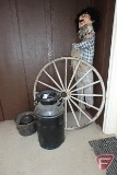 Old wood spoke wheel, milk can with cover, scare crow, jug, and metal pot