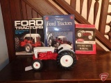 Ford toy tractor and vintage Ford books
