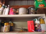 Contents of 2 shelves: Deer & Rabbit repellent, plant food, handheld broadcast spreader,