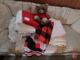 Blankets, linens, and bear
