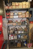 Shelf and contents: nuts, bolts, tractor lights, brass fittings, nails, tail lights, side