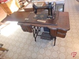 Standard treadle sewing machine and cabinet