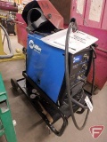 Miller Millermatic 135 wire feed welder ,110 volt, incl helmet, wire, regulator and cart