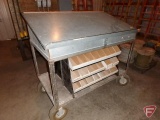 Blueprint table with hardware organizer on wheels
