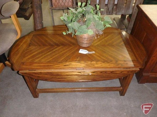 Drop side wood coffee table, 43inWX31inD with sides up, one side needs repair and