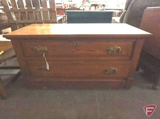 Wood storage cabinet on casters, missing one caster, 2 drawers, 24inHx44inWx20inD