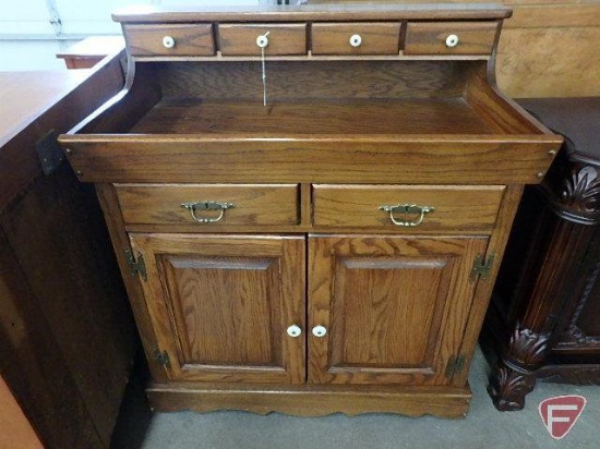 Wood storage cabinet on casters, 2 drawer 2 doors on bottom, 4 drawers on top,
