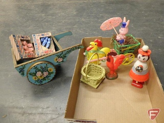 Vintage items, painted cart, plastic birthday candle holders, plastic noisemaker,